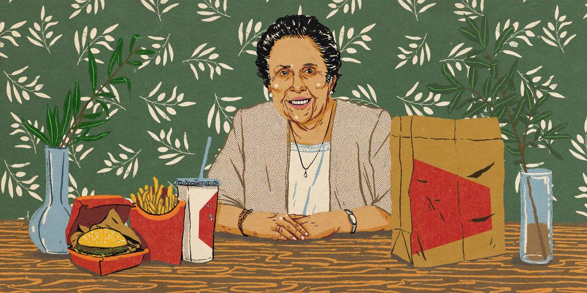 An illustration of Aban Pestonjee sitting at a table with a fast food meal.