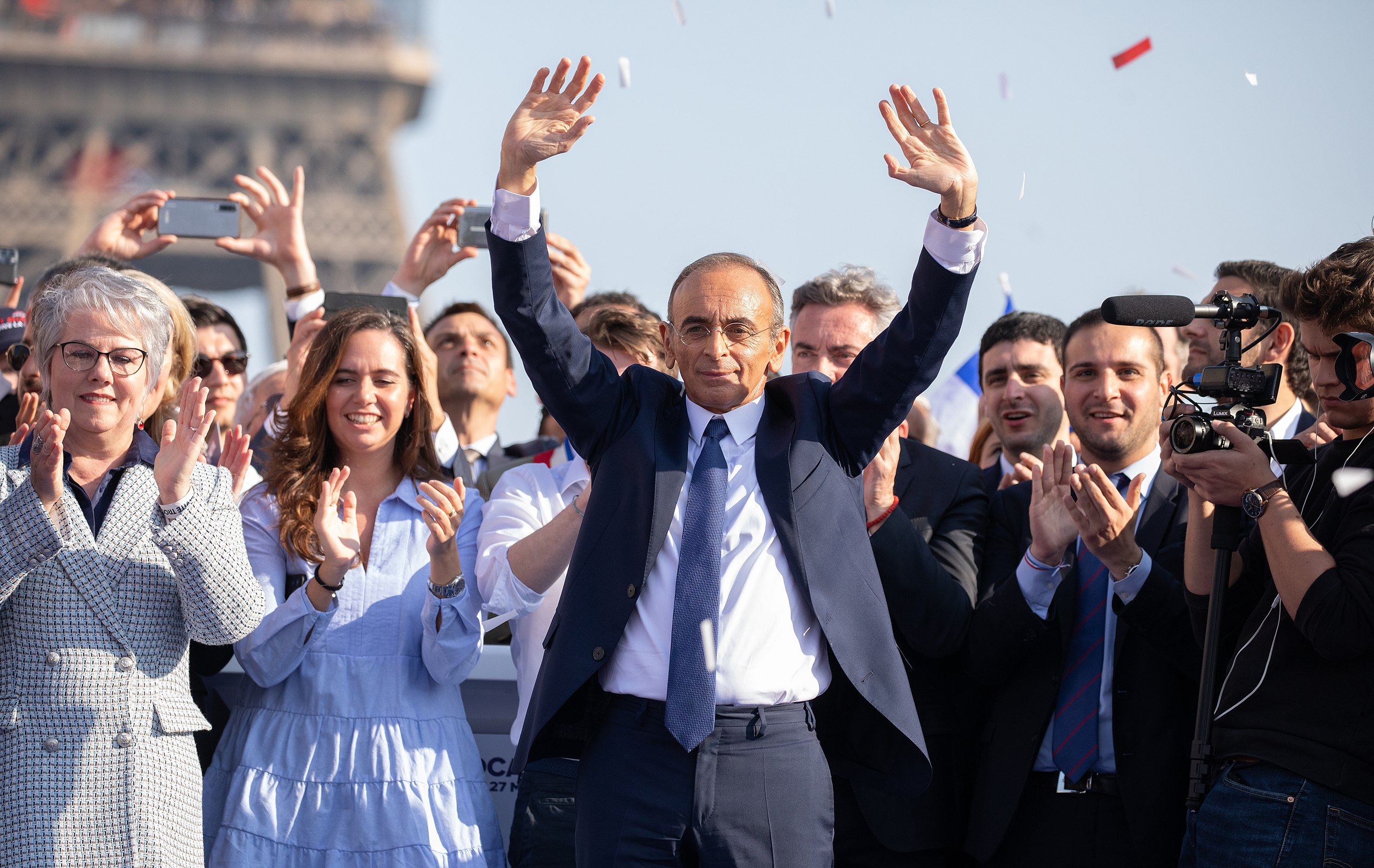 "Eric Zemmour surrounded by supporters at the end of his meeting at the Trocadero on March 27, 2022."