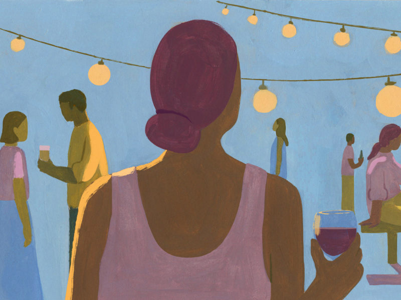 A painting of a woman from behind, holding a glass of wine and looking out at a party where everyone is socializing.
