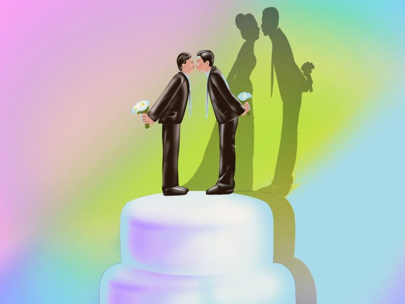 An illustration of a wedding cake with a rainbow of colors in the background. At the top of the cake is a cake topper with a queer couple, both wearing suits, leaning towards one another for a kiss; both holding bouquets behind their back. In their shadow, we see a heteronormative couple, with one wearing a wedding dress.