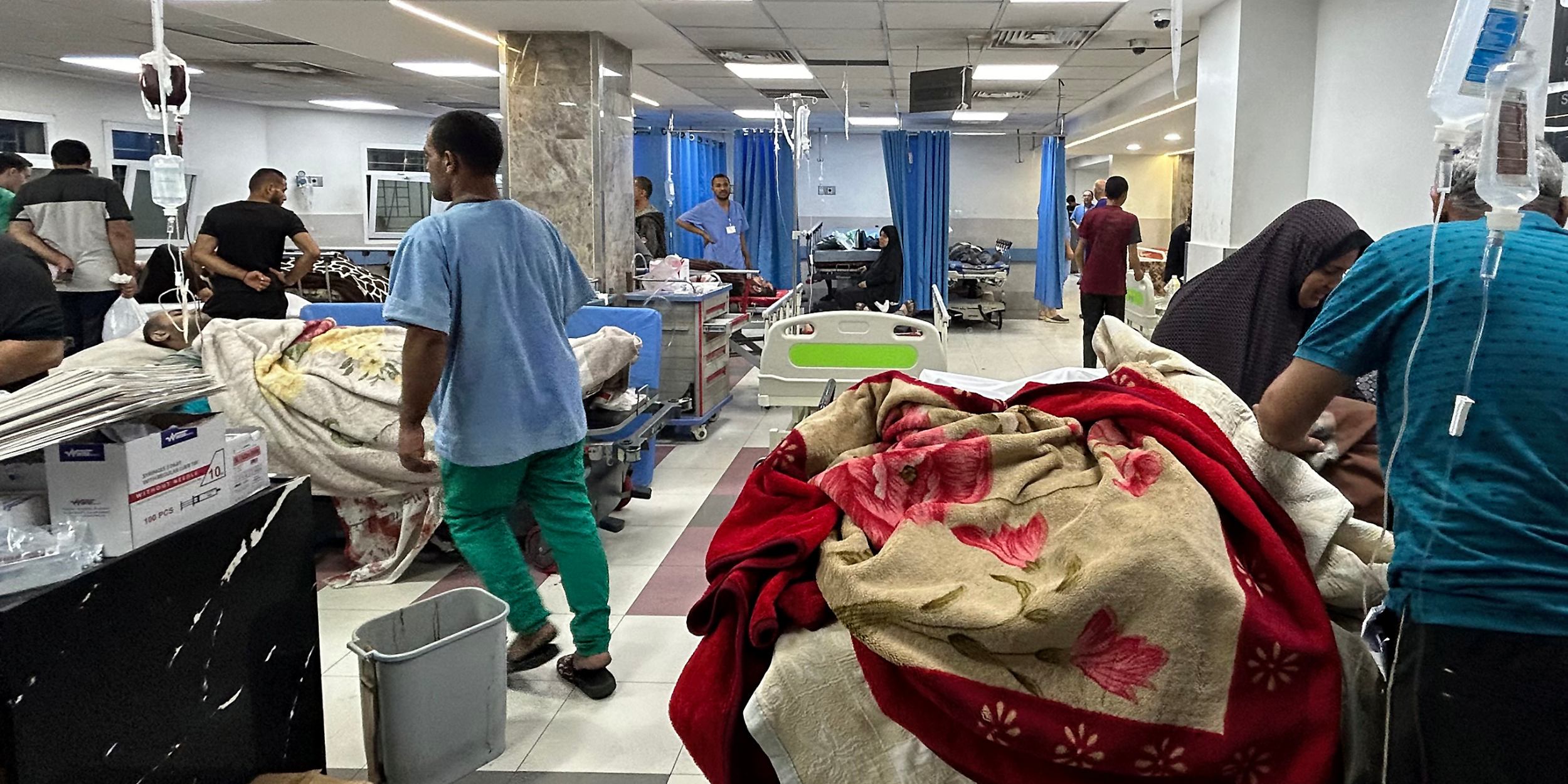 Patients and medics at Al-Shifa Hospital in 2023.