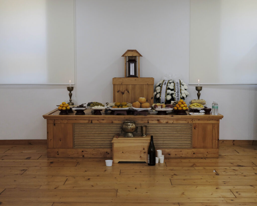 A jesa table at Sejong Memorial House piled with offerings.